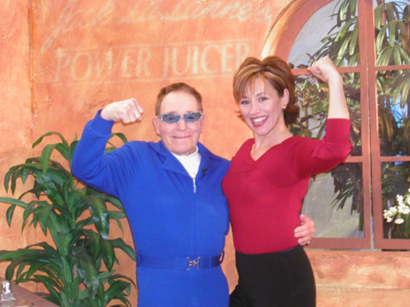 Forbes flexing with Jack LaLanne on the Power Juicer set