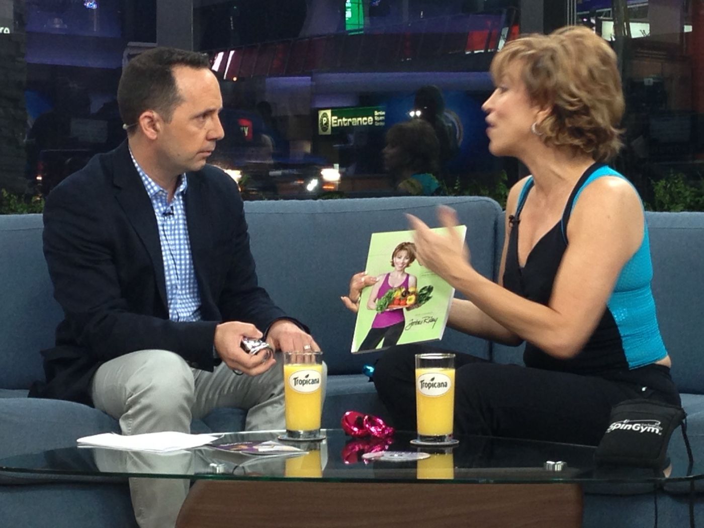 Forbes being interviewed on a talk show set